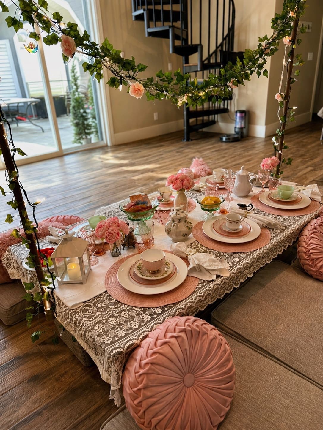 Indoor boho picnic with soft textures, elegant table settings, and romantic touches.